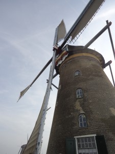 photo looking up at a tall windmill on www.adventuresinexpatland.com