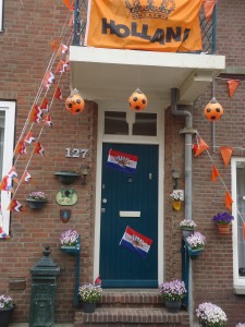 Typical Dutch house decorated for national voetbal game at www.adventuresinexpatland.com