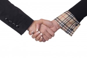 Photo of a handshake involving two women by patrisyu portfolio 6621 freedigitalphotos.net